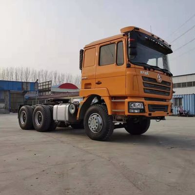 6×4 Shacman Tractor Truck Head Χρησιμοποιείται με σχεδιασμό ακτινοειδούς ελαστικού και τροχιά κίνησης